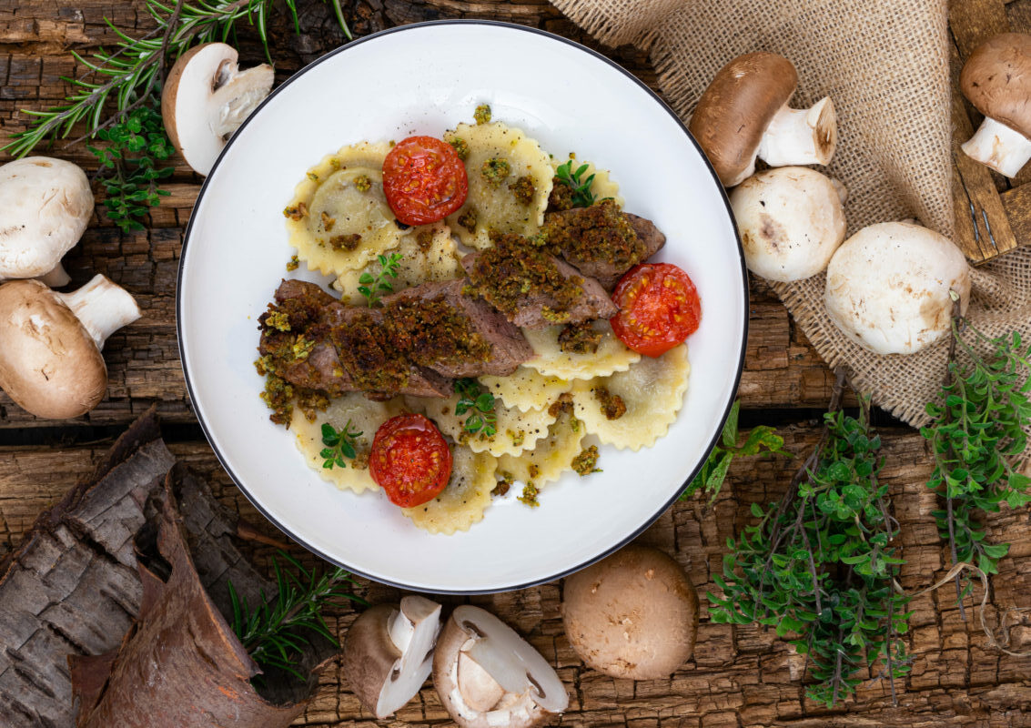 Rezept für Steinpilz-Champignon-Tortelli mit Wildschweinfilet